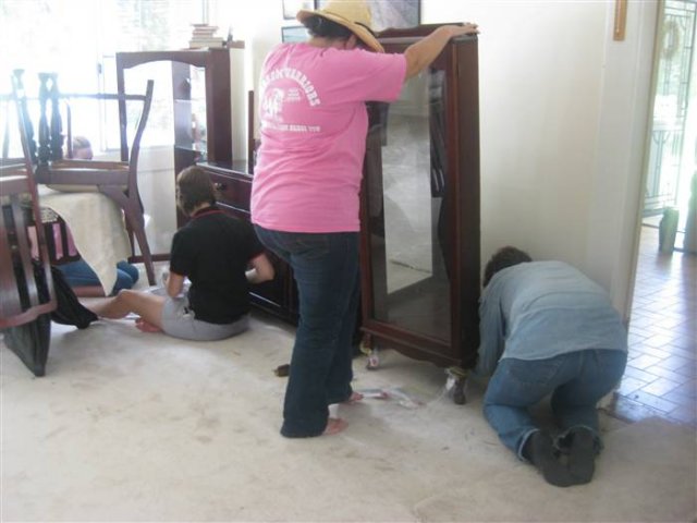 Neighbours Help Move the Furniture